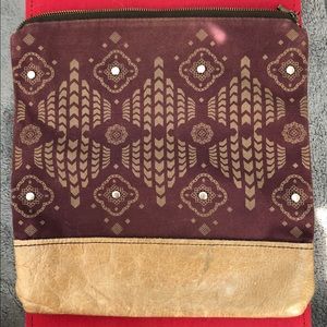 Purple tribal folded clutch bag